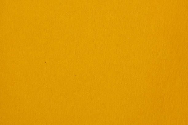 istock Yellow flat fabric made of cotton material with holes 1331994472