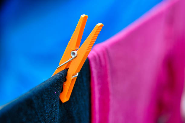 istock Clothespin orange and three colors 1331994702