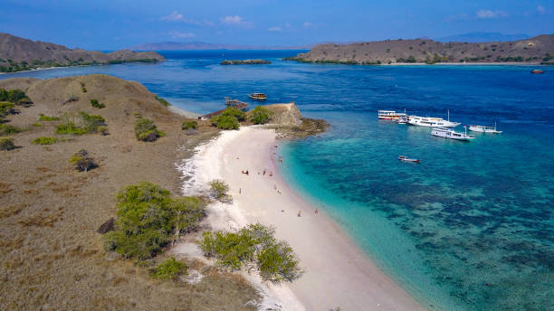 Amazing landscape of labuan bajo, indonesia pink sand beach aerial view bajo stock pictures, royalty-free photos & images