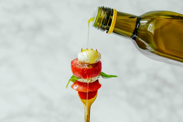 Caprese salad Caprese salad food styling stock pictures, royalty-free photos & images