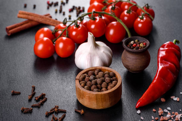 istock ingredients for cooking, spices, garlic, tomatoes and herbs 1332003530