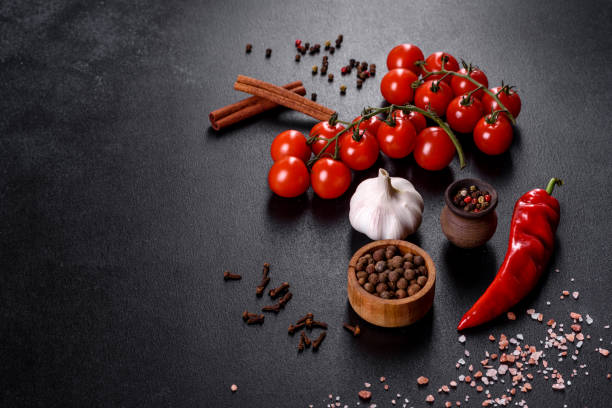 istock ingredients for cooking, spices, garlic, tomatoes and herbs 1332003588