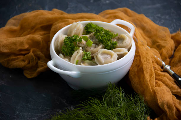 istock dumplings on wooden background, food 1332004579