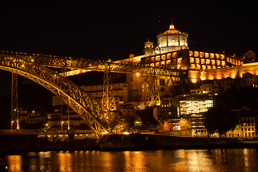Night shot of Porto looking towards Vila Nova de Gaia, with the illuminated \