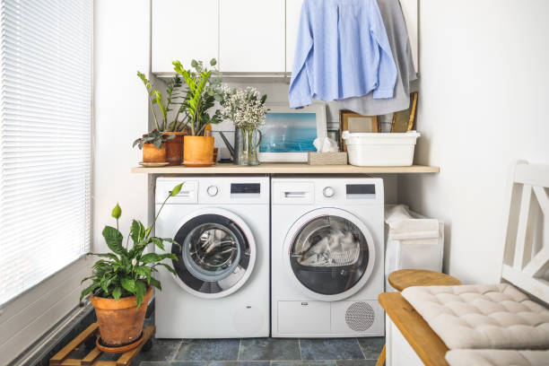 zuhause - waschmaschine stock-fotos und bilder