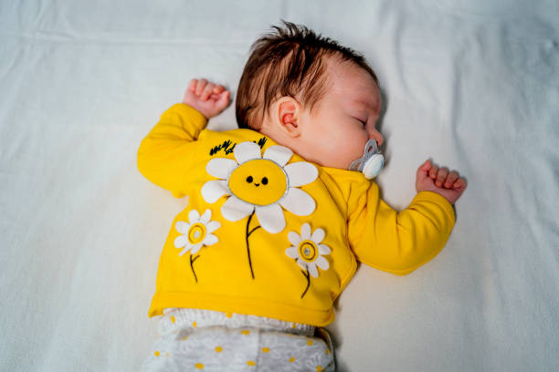 istock Baby sleeping peacefully at home 1332010110