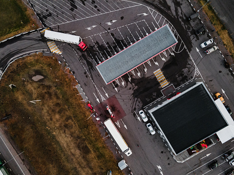 Aerial view of parking lot and gas station