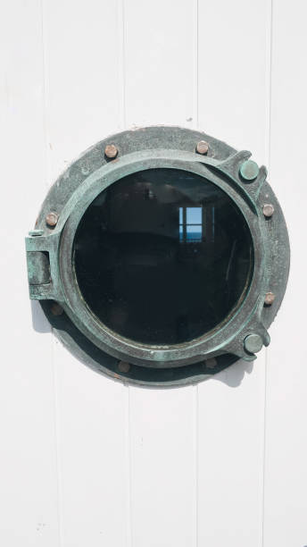 istock Porthole Window in white door 1332013217