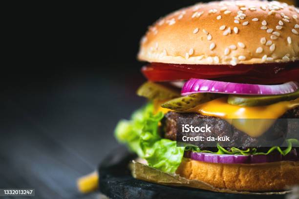 Tasty Hamburger With French Fries Stock Photo - Download Image Now - Cheeseburger, Burger, Potato Chip