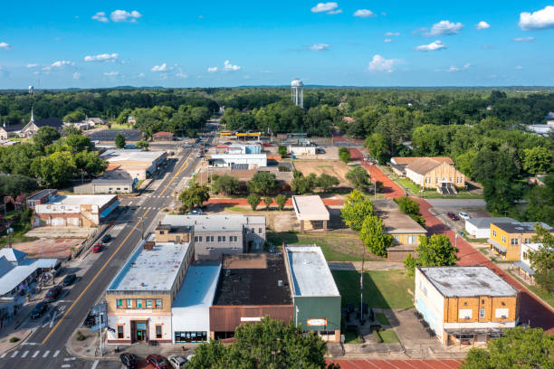 Small Town USA - Aerial Downtown Aerial view of Gladewater, Texas and surrounding landscape. rural main street stock pictures, royalty-free photos & images