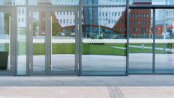 istock large department store doors with glass reflect paved road 1332016640