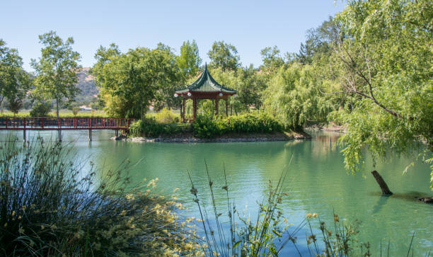 istock Japenese gazebo in a garden 1332018951