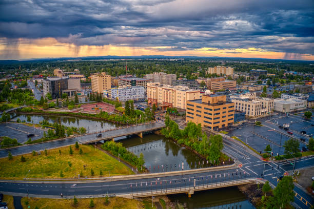 Aerial View of Downtown Fairbanks, Alaska during a stormy Summer Sunset stock photo