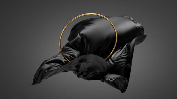 istock 3d render, abstract fashion wallpaper. Modern minimal composition with black silk fabric, levitating cloth drapery and golden ring, isolated on dark background 1332020026