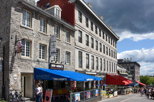 Place Jacques-Cartier square in Old Montreal, Quebec Montreal, Canada - July 31, 2021: People enjoy Place Jacques-Cartier a square with many businesses and restaurants in Old Montreal, Quebec, Canada near the Old Port of Montreal. place jacques cartier stock pictures, royalty-free photos & images
