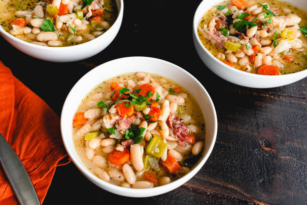 istock Bowls of White Bean and Ham Soup with Bread 1332024054