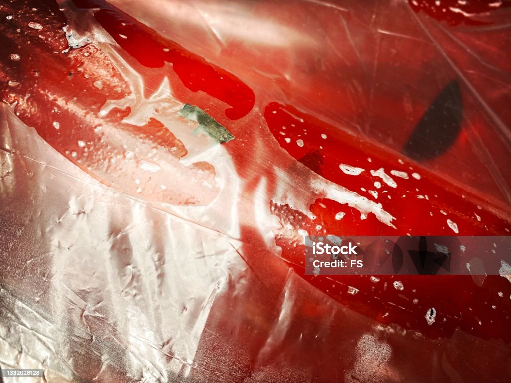 Red Inflatable Texture Red Inflatable Toy Wrapped In Plastic Stock Photo - Download Image Now ...