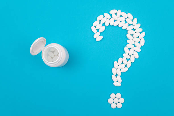 istock White Question Mark. Pharmaceutical Industry and Medicinal Products 1332029763