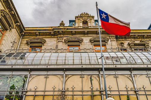 Palacio Sara Braun Palace Chilean Flag Punta Arenas Chile.  Palace built in late 1800s, located central square downtown Punta Arenas