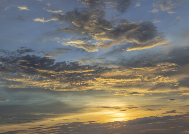 istock Beautiful sunset sky above clouds with dramatic light, Beautiful blazing sunset landscape. 1332033493