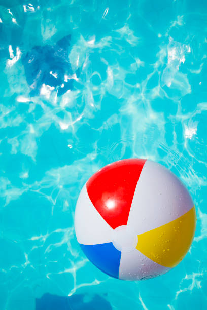 istock Ball floating in swimming pool. 1332033611