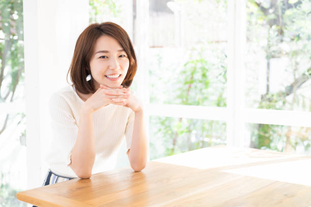 istock attractive asian woman relaxing 1332035921