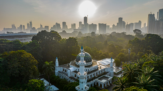 Aerial view of White mosque. Top view of the mosque forest. Jakarta, Indonesia