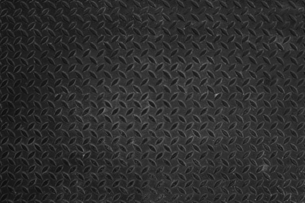 istock Close up black steel texture background. 1332044497