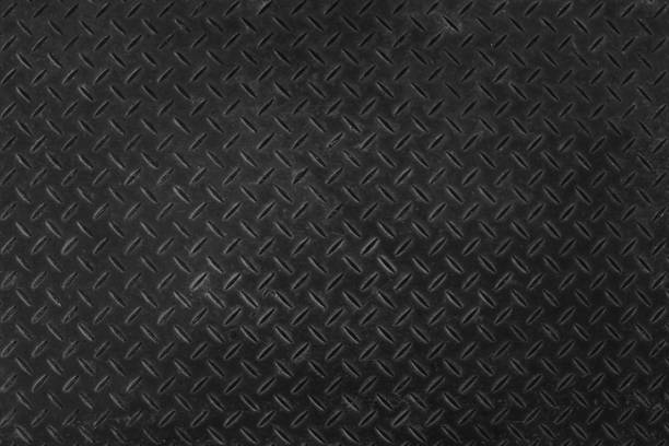 istock Close up black steel texture background. 1332044510