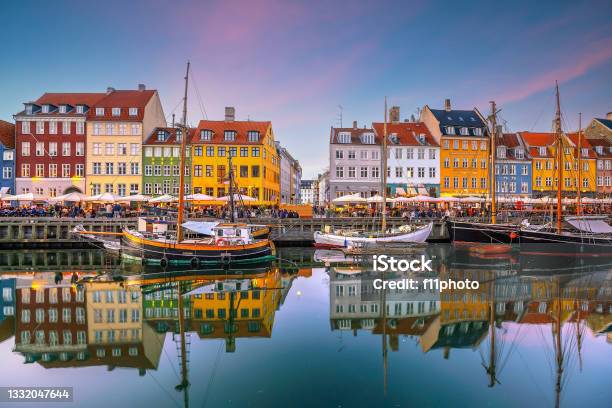 Copenhagen City Skyline In Denmark At Famous Old Nyhavn Port Stock Photo - Download Image Now