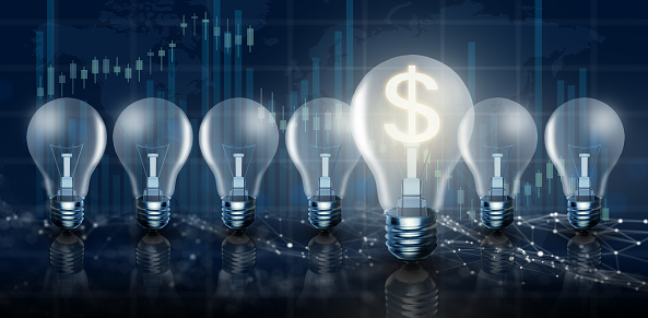 Illuminated light bulb in a row. One different Glowing with dollar sign inside on stock market graph background. Money making idea and Growth of dollar exchange rate Concept. 3D Render.