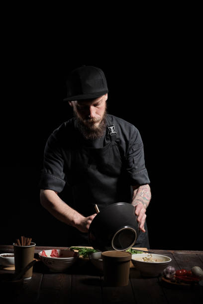 istock Chef cooking fresh asian food 1332064489