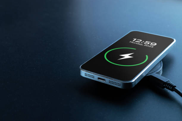 istock Phone charge. Mobile cell phone charge battery from wireless smart charger. Modern technology, portable fast charger. 1332065727