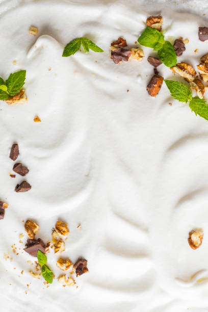 istock Whipped cream of egg whites with chocolate, nutmeg and mint. 1332066539