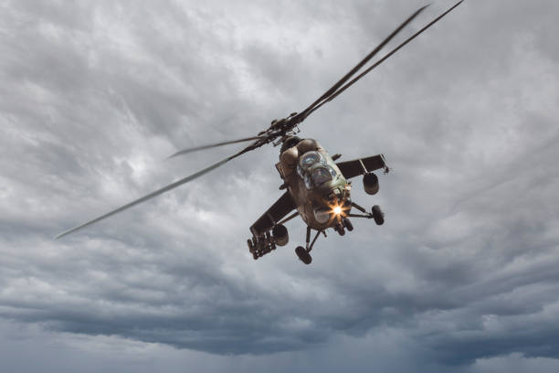 istock Military helicopter in the sky 1332066563