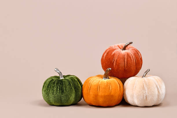 Multi colored pumpkin decoration made from velvet fabric