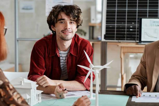 istock Architect sitting at meeting at office 1332068585