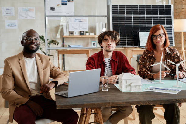 istock Business people sitting at meeting 1332068596