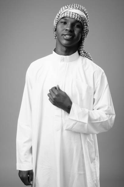 istock Young African man wearing traditional Muslim clothes 1332068894