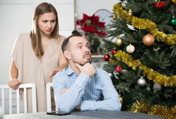 istock Man and woman quarreling during Christmas 1332071995