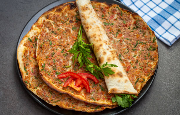 istock Traditional delicious Turkish pizza (Turkish name; Lahmacun) 1332072023