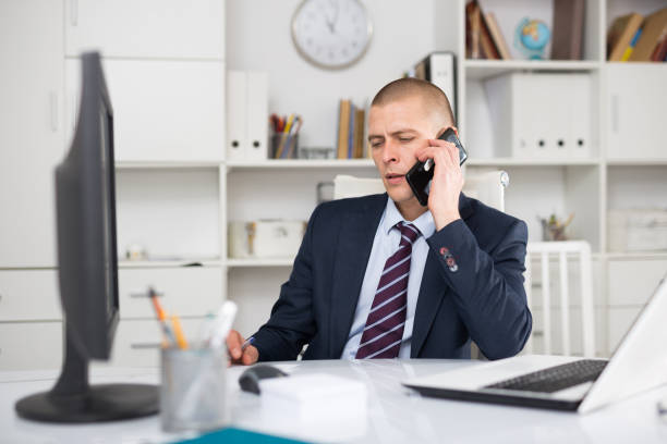 istock Young businessman working on laptop 1332073042