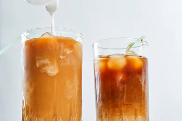 istock Ice coffee in a tall glass 1332073676