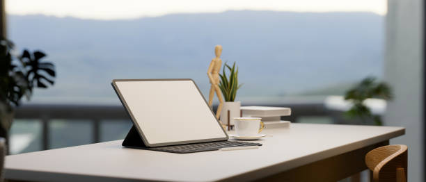 istock Portable tablet mockup on outdoor working table, 3d rendering 1332080704