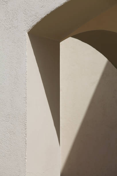 istock abstract lines of arches. art and design concept. shadow texture. space for text. Light and shadow on gray wall. 1332083208