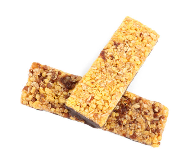 istock Granola bars on white background, top view. High protein snack 1332086106