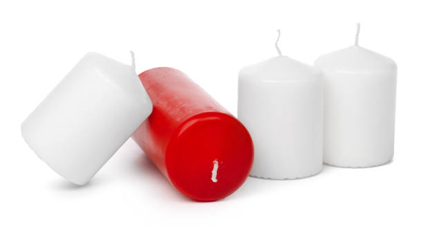 istock Wax colored candle isolated on white background close up 1332086125
