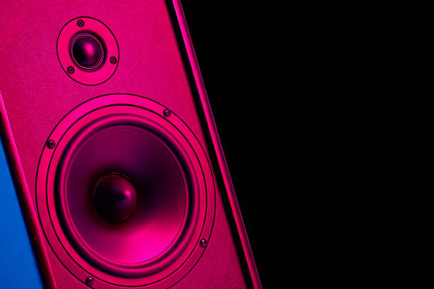 istock Stereo speaker with neon light on dark background 1332088014