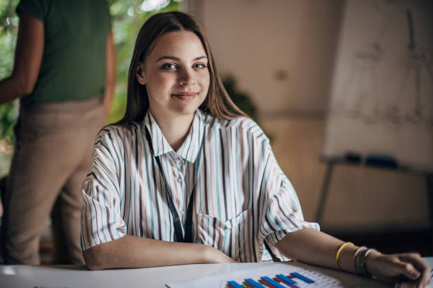 istock Young woman working in office 1332097042