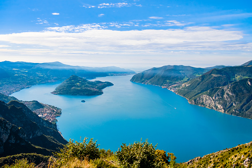 Lake Iseo and its island Monte Isola as seen from the Corna Trentapassi, a mountain on the eastern shore of the lake
